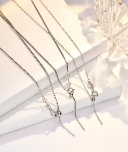 S925 sterling silver adjustable versatile necklace detail, sparkling bead and box chain design.