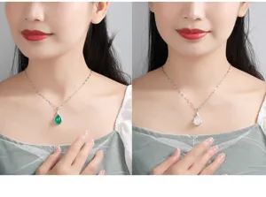 Nahaufnahme Detailaufnahme des edlen Tropfen Chalcedon Halsketten Anhaengers in Silber.