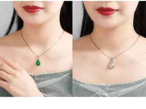 Nahaufnahme des eleganten Tropfen-Edelstein-Halsketten-Anhängers mit feinen Silberdetails.