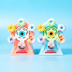 Simpatico temperamatite manuale a forma di ruota panoramica con ciambella, ideale per studenti.