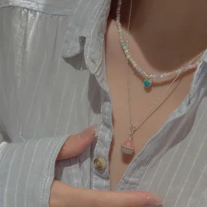S925 sterling silver dual layer necklace with pink cupcake and blue heart pendants for women.