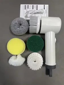 Cordless electric cleaning brush with multiple replacement heads for kitchen and bathroom.