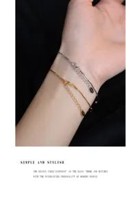 Close-up detail of S925 sterling silver snake bone bracelet showing delicate wrist wear.
