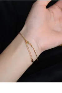 Detail shot of s925 sterling silver gold plated snake bone bracelet wrist wear close up