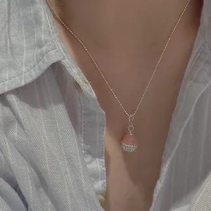 Dainty S925 silver necklace featuring a charming pink cupcake pendant, perfect for sweet daily styles.