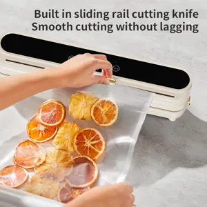 Household vacuum sealer machine for food storage dry and wet dual use with built in cutter