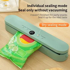 Compact electric vacuum food sealer machine for household kitchen and vegetable meat preservation.