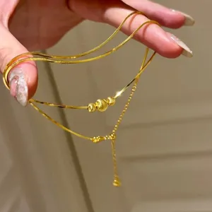 Gouden slangenketting ketting met ronde kralen en kwastje hanger voor dames elegant