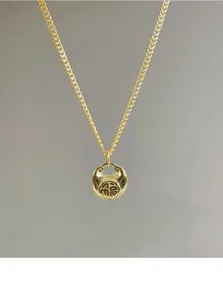 Delicate s925 silver gold-plated mini fu lock pendant necklace for elegant women.