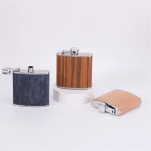 Portable 304 stainless steel hip flask set with wood grain and camo finishes for outdoor travel.