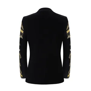 Gold embroidered details on the sleeve of this black velvet men's suit jacket detail.