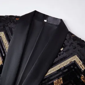 Men's black and gold sequin suit jacket detail shot, stylish tuxedo collar design for parties.