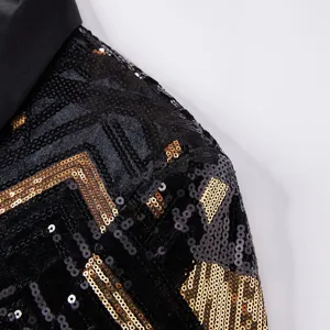 Close-up detail of men's black and gold sequin blazer, showing exquisite geometric sequin patterns.