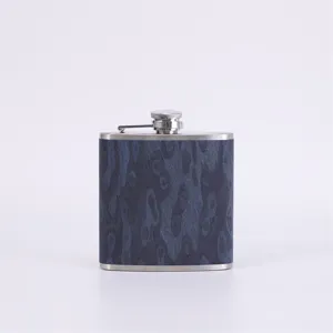 Portable 304 stainless steel hip flask with stylish blue wood grain finish for outdoor travel.