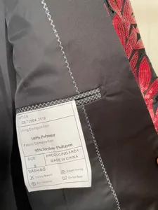 Detailed view of the men sequin suit inner lining and washing label, fine craftsmanship.