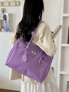 Large capacity purple jelly tote bag for women, stylish shoulder handbag for daily work commuting.