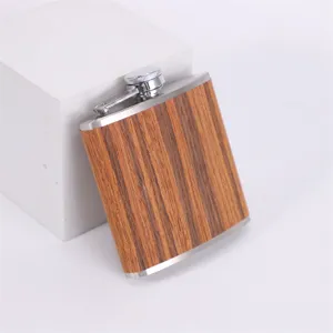 Stainless steel hip flask with wood grain finish, portable outdoor pocket alcohol container.