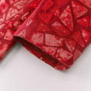 Men red sequin blazer detail shot, luxury velvet fabric with geometric triangle embroidery.