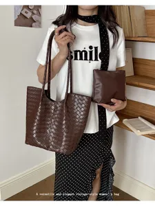 Brown woven tote bag for women, large capacity stylish shoulder bag with matching pouch.
