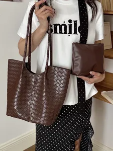 Fashion woven leather tote bag for women, large capacity shoulder bag with pouch for daily commuting.