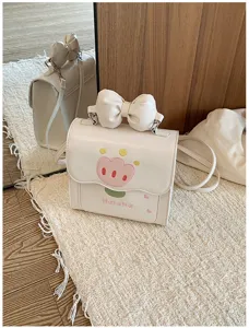 Joli petit sac bandoulière blanc avec noeud 3D et charmante broderie de tulipe pour les femmes.