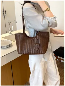 Brown woven leather tote bag for women, large capacity stylish shoulder bag for daily commute.