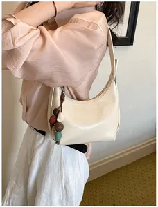 Minimalist leather underarm bag for women, chic bead pendant shoulder bag, stylish casual handbag
