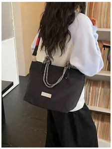 Casual large capacity tote bag with braided rope handles and shoulder strap for daily commuting.