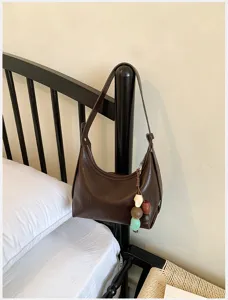Minimalist brown hobo shoulder bag for women, chic daily casual faux leather underarm handbag.