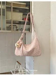 Pink polka dot shoulder bag with cute plush bear pendant, casual hobo underarm bag.