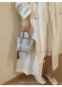 Neuer chinesischer Retro geometrischer Handtaschen minimalistischer Shopper mit Quaste.