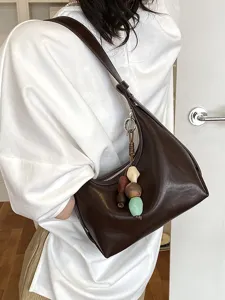 Minimalist brown leather hobo bag for women, chic shoulder crossbody handbag with bead charm.