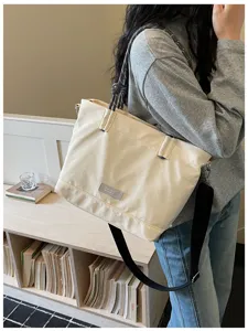 Casual large canvas tote bag, stylish handbag for daily commute and minimalist shoulder.