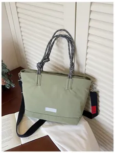Casual large capacity tote bag with rope handles and crossbody strap for daily commute.