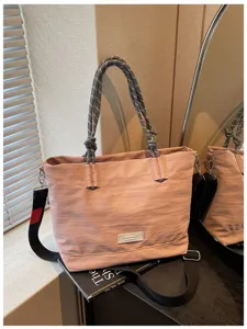 Casual large capacity pink tote bag for women, stylish nylon shoulder and crossbody bag.