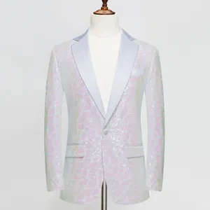Close-up of men's geometric sequin suit jacket lapel and fabric detail for evening party.