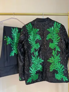 Conjunto de chaqueta y pantalón de traje negro para hombre con lentejuelas verdes show.