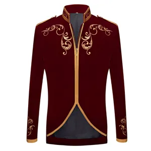Detail view of men burgundy velvet royal jacket with exquisite gold embroidery and piping.