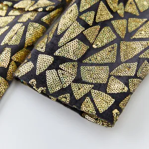 Black velvet sleeve detail with geometric gold sequin triangle embroidery for men fashion wear.