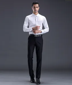 Men's black dress pants detail shot showing slim fit cut and professional office style.