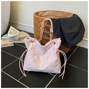 Pink quilted chain tote bag for women, featuring stylish drawstring and shoulder straps.