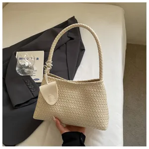 Woven underarm shoulder bag for women, retro faux leather handbag with single handle stylish chic.