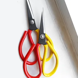 Heavy duty utility scissors with red and yellow handles for household and industrial cutting work