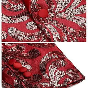 Close-up detail of red sequin men blazer fabric, buttons, and intricate embroidery pattern.