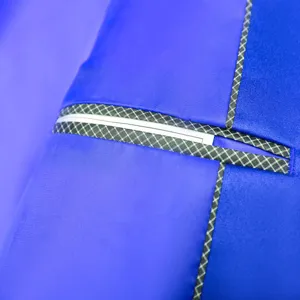 Men royal blue suit jacket detail view, fine grid welt pocket tailoring craftsmanship upper.