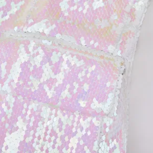 Detalle de tela de material de lentejuelas reversibles rosa y blanco primer plano