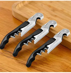 Detailed view of multi-functional stainless steel waiter corkscrew and wine bottle opener.