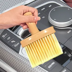 Car interior cleaning brush with soft bristles for air vents, dashboard, and seat gaps use.