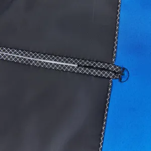 Detailed view of the men's suit jacket inner pocket lining and stitching craftsmanship.