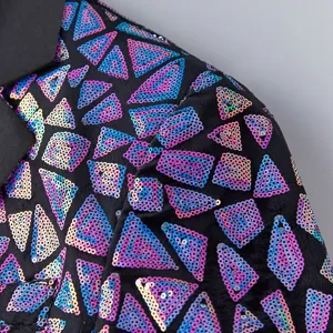 Close-up detail of men's black sequin blazer featuring colorful geometric triangle patterns.